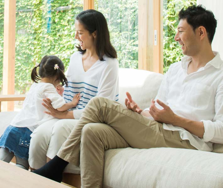 A family relaxing in the living room